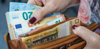Работающих в Литве и Великобритании белорусов ждет двойной налог