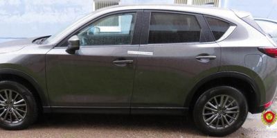 Пьяный гродненец сбросил бутылку на припаркованную во дворе "Мазду". Во сколько эксперты оценили ущерб?